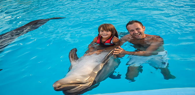 COUPLE SWIMMING